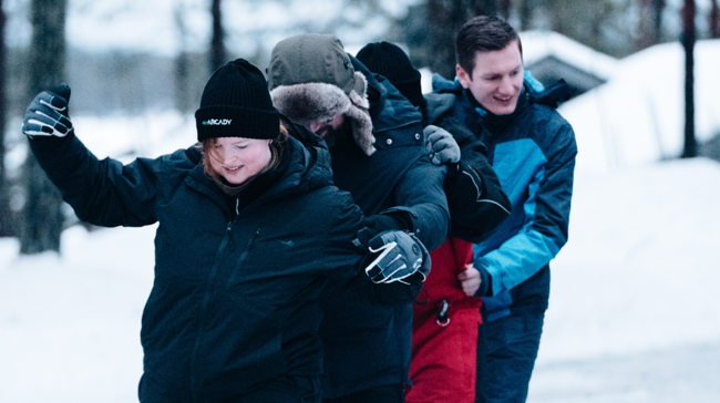 Arcady team in de sneeuw tijdens 10-jarig jubileum in Lapland